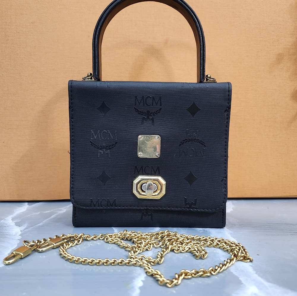 MCM Black Handbag with Gold Accents